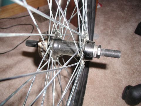 1998 Jeep TJ - This image shows a close-up view of a bicycle wheel's hub and spokes.