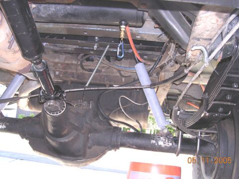 1994 Ford Bronco - I cut some ears out of 1/4 flat to weld to the top. These are 12 inch travel ranchos, set for 3.5 of up travel at 63 degrees. I can move th…