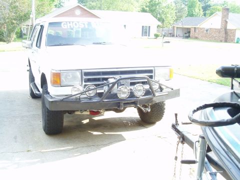 1990 Ford Bronco - Lights up front, Warn floods for cornering, KC middle forlong range, and WallyWorld Blasters for xtra driving