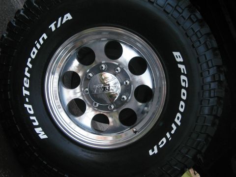 1994 Ford Bronco - Close-up of a BFGoodrich Mud-Terrain T/A tire and a chrome wheel.