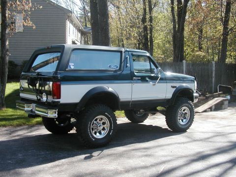 1994 Ford Bronco - This lifted Ford Bronco has a two-tone paint scheme and off-road tires.