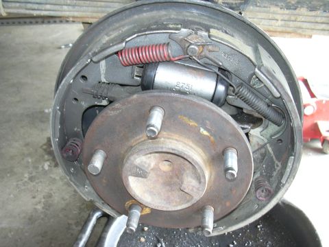 1991 Ford Bronco - Drum brake assembly showing wheel cylinder with part number 2751 and brake shoes.