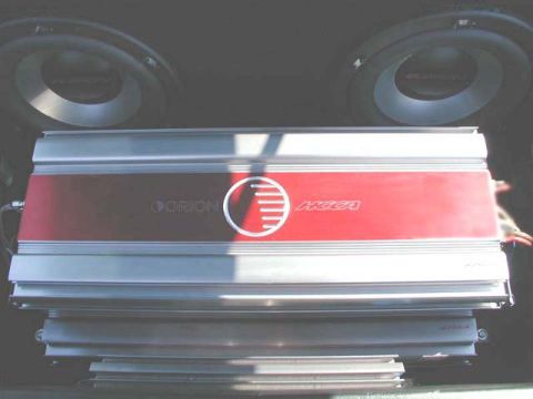 1996 Ford Probe - Car audio equipment including an Orion HCCA amplifier and subwoofers is visible in the trunk.