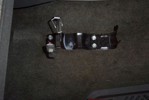 1992 Ford F-150 - Metal bracket- alot stronger than the flimsy plastic ones they send with the FE. Mounted to the floor with self tapping screws.