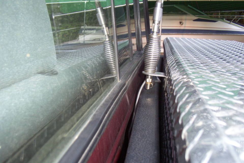 Antenna bracket and spring
