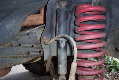 1992 Ford F-150 - Stock right shock. Top bolt is 18mm and the shock is 15mm. The bottom nut and bolt are both 18mm.