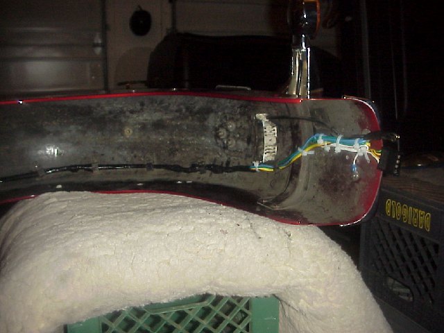 Wiring up the rear for the trailer hitch connection.
Had to get a little creative, since I was too cheap to buy a proper wiring kit from the hitch manufacturer.