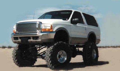 1993 Ford Bronco - This lifted SUV features a custom grille and enormous tires, suggesting off-road capability.