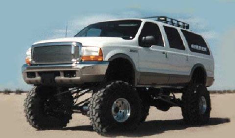 1993 Ford Bronco - This lifted SUV has a custom grille and large off-road tires, suggesting a model year around 2000.