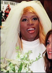 1986 Ford Bronco - Dennis Rodman is pictured in a wedding dress, possibly for a publicity stunt or event.