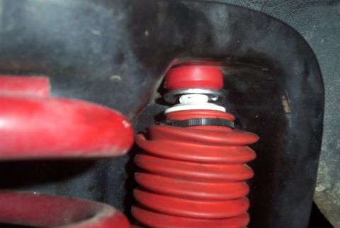 1992 Ford F-150 - Correct install. Both bushings and both new washers. Top bolt from Rancho is a 9/16, and I used a pare of Vise-Grips to hold the shock in p…
