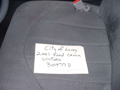 1999 Ford Crown Victoria - A handwritten note on a car seat identifies it as a 2001 Ford Crown Victoria.