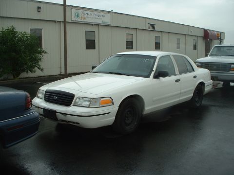 1999 Ford Crown Victoria - 1999 Ford PI. Looks like a former K-9 Unit with Lacey, WA police.