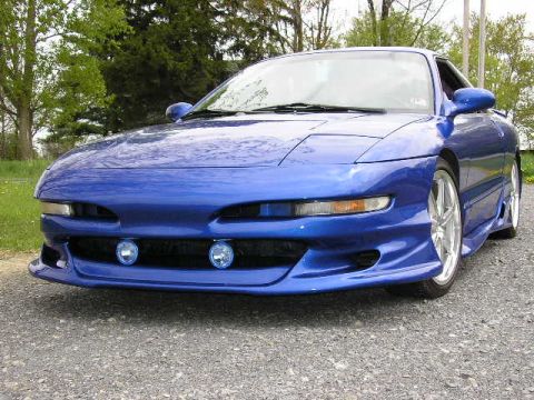 1994 Ford Probe - Front view of a blue 1994 Ford Probe with aftermarket modifications.