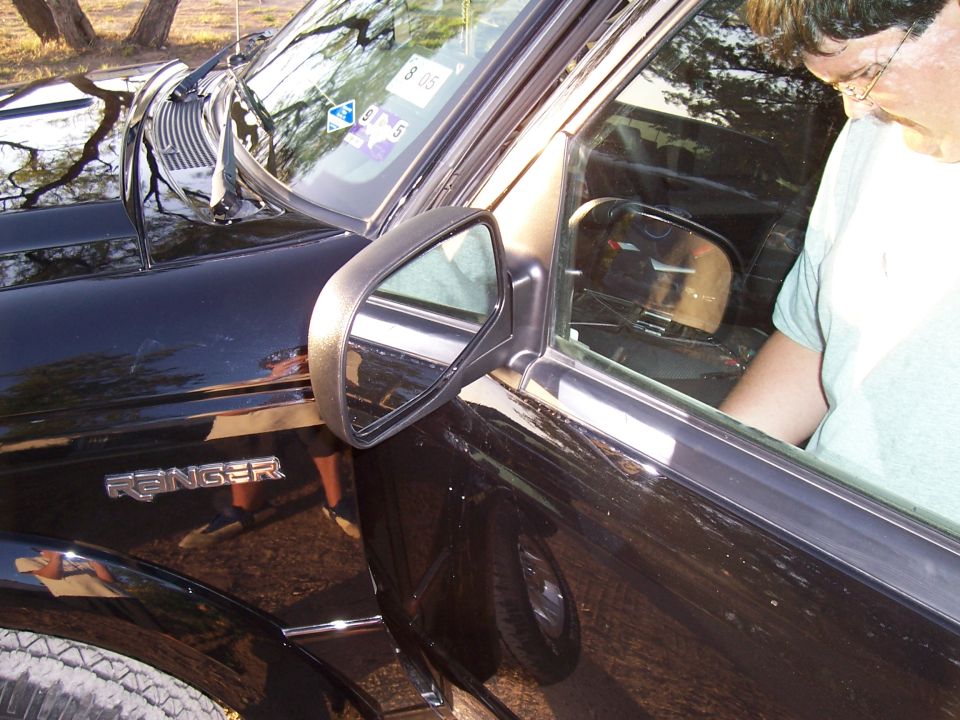Black Ford Ranger fender badge on side of vehicle