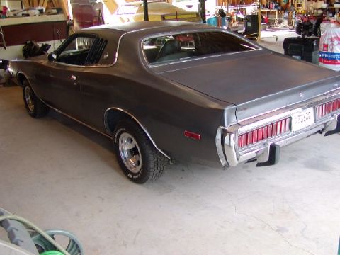 1988 Ford Bronco - Rear view of a 1973 Dodge Charger with a trailer hitch visible.