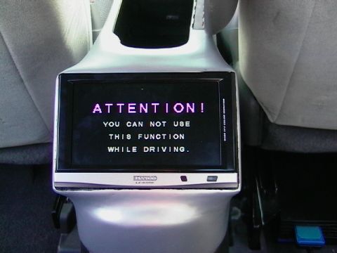 1999 Ford Taurus - A close-up of a digital display screen showing status information.
