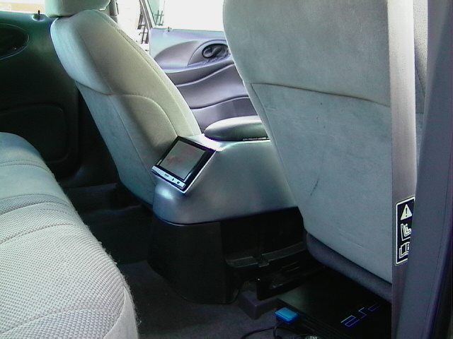 Interior shot of a car's passenger side door and seat