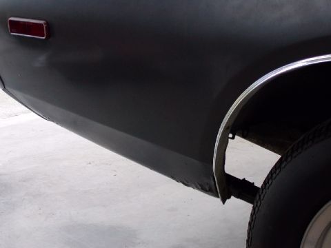 1988 Ford Bronco - This image shows the rear side of a vehicle, focusing on the quarter panel and wheel well area.