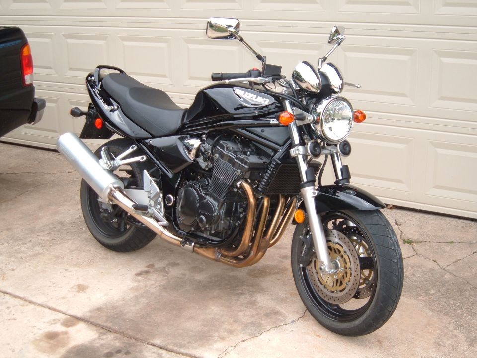 Black Suzuki Bandit naked motorcycle parked on a driveway