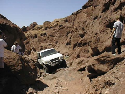 1997 Ford Ranger - White 1997 Ford Ranger driving through a rocky canyon during a Calico Trip.