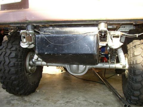 1995 Ford Bronco - The rear axle, fuel tank, and suspension are visible on this modified vehicle.