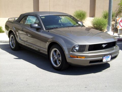 2002 Ford Mustang - This Ford Mustang convertible has a gray exterior and a black soft top.