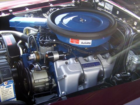 2002 Ford Mustang - The engine bay features a prominent blue air cleaner and silver valve covers with 'BOSS 429' lettering.