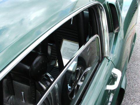 2005 Ford Mustang - Framed document inside a 1967 Shelby GT500 details its history and mileage.