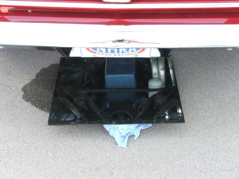2005 Ford Mustang - Car's underbody with a license plate frame visible, suggesting drag racing.