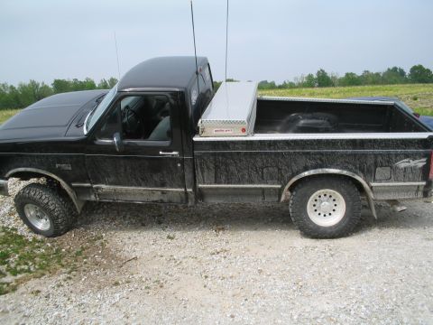 1979 Ford F-150 - This pickup truck appears to be from the early to mid-1990s, not a 1979 model.