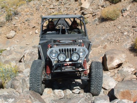 1994 Jeep YJ - Drew's Buggy (notice the avaiation style headsets that play XM radio and serve as an intercom, hard to see with the shadows...)