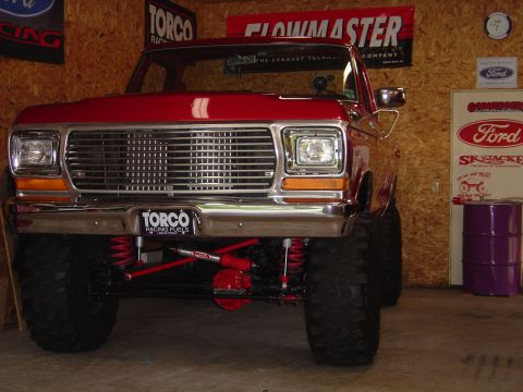 1978 Ford Bronco - This lifted 1978 Ford Bronco features a prominent chrome grille and aggressive off-road tires.
