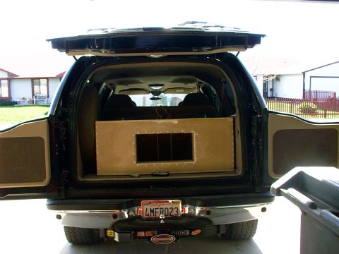 2000 Ford Excursion - Custom speaker box installed in the rear cargo area of a 2000 Ford Excursion.