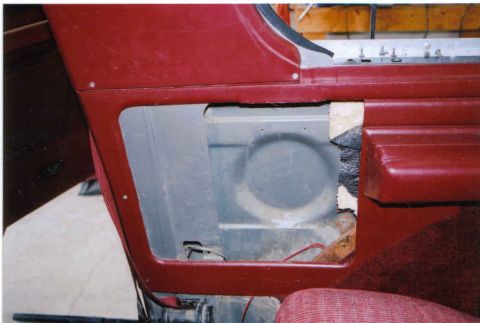 1987 Ford Bronco - removed original 6x9 and cut out section following the natural seam of panel using dremel