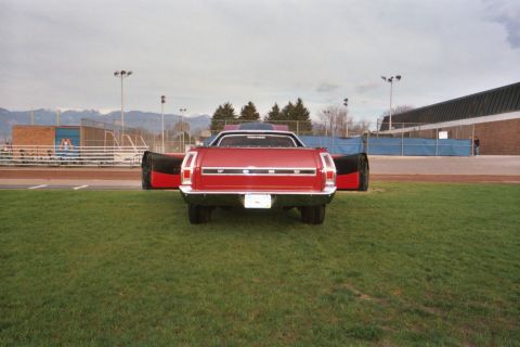 1972 Ford Ranchero - This 1972 Ford Ranchero is displayed with its doors open, revealing its interior and the bed of the truck.
