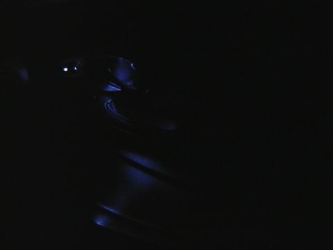 1999 Ford Taurus - Blue ambient lighting illuminates the interior of a car.