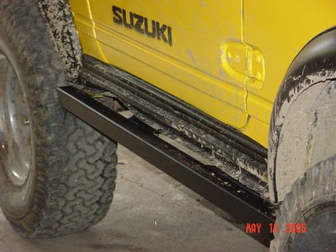 1987 Suzuki Samurai - Finally got around to putting the rock sliders on...if you look closely you can see why...LOL (Man she was mad at me for that one)