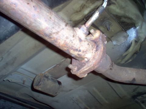 1994 Ford Crown Victoria - Detail of the R catalytic converter flange showing the stamped nuts & resonance weight.