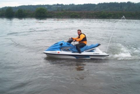 2004 Yamaha XL700 3-Pass - Rider on a 2004 Yamaha XL700 3-Pass jet ski moving through the water.