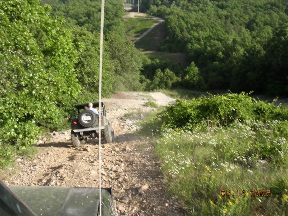 1995 Jeep Cherokee on a dirt road, rear view