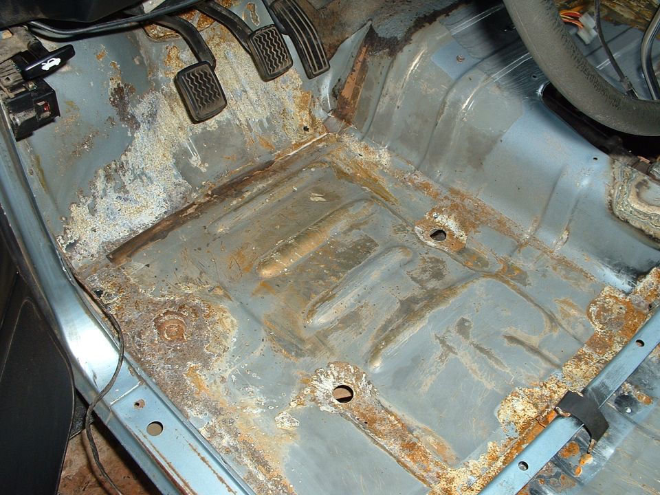 This is after the metal etcher was applied. The white stuff is zinc that formed over the rust to kill it. Thats what the POR15 people said anyway