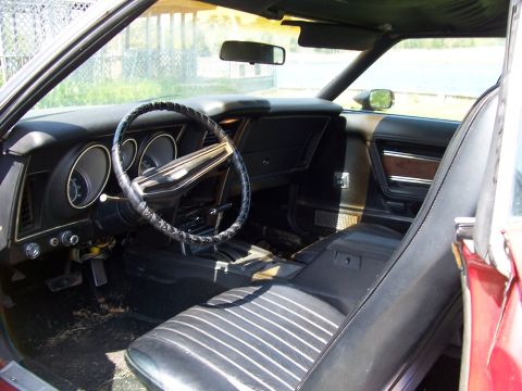 1971 Ford Mustang - Interior view of a 1971 Ford Mustang, highlighting the dashboard and seating.
