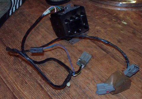 1985 Ford LTD Crown Victoria - Climate control module with wiring harness and connectors, buttons labeled M, R, S, and Temp.