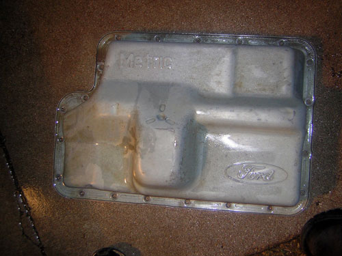 Ford transmission pan with 'Metric' and Ford logo embossed