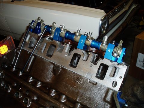 1966 Ford Fairlane - Engine block assembly with camshaft and rocker arms. The blue caps are labeled 1, 2, 3, and 4.