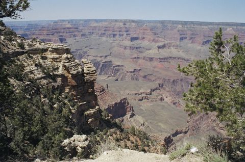 1994 Ford Bronco - A scenic view of the Grand Canyon, its vast geological formations under a clear blue sky.