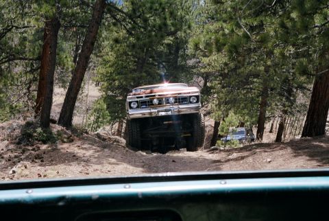1996 Ford Bronco - Rob lifts a tire going up hill.