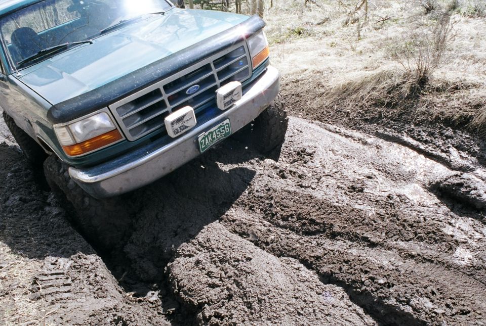 After just being strapped out the mud flowed back into the ruts.