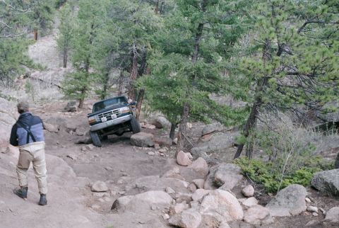 1996 Ford Bronco - More climbing and sliding. Guy in Suspenders is on Colorado4x4 and was giving me a spot.